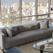 The Arya Modular Sectional in Porpoise Fabric and Color in a Living Room Next to Window