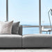 Close Up View of The Arya Modular Sectional in a Living Room Against a Window