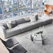 Top View of The Arya Modular Sectional in a Living Room Against a Window