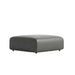 Angled Side View of The Arya Ottoman in Trento Black Frabric and Color