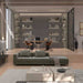 Front Facing View of The Berlin Armless Modular Piece Between Corner and Ottoman Modular Pieces in Moonstone Fabric in a Living Room