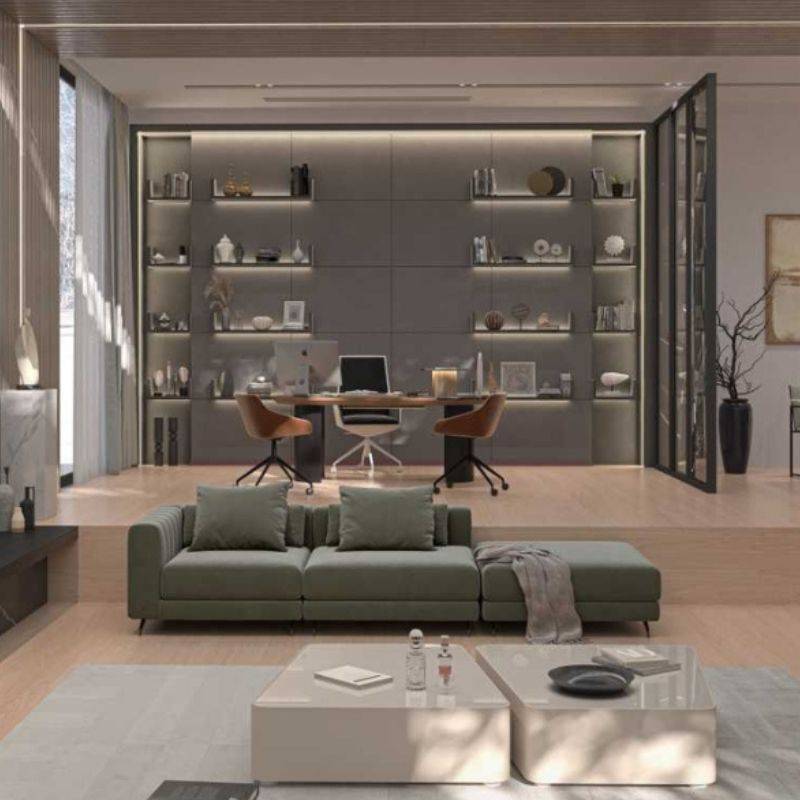 Front Facing View of The Berlin Armless Modular Piece Between Corner and Ottoman Modular Pieces in Moonstone Fabric in a Living Room