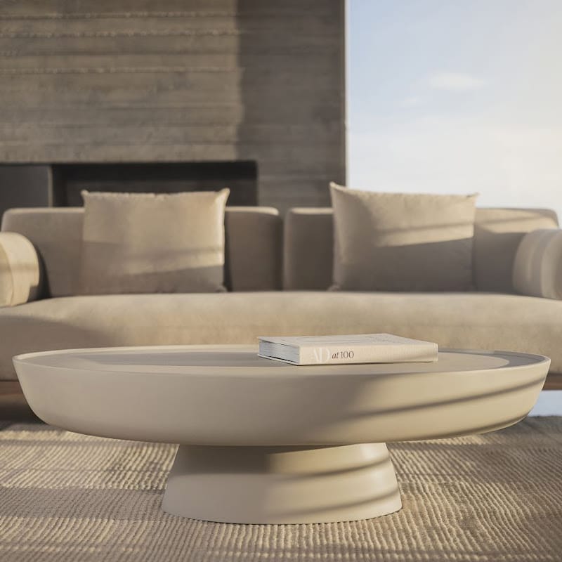 Front Facing View of the Maria Coffee Table in Alabaster Concrete in a Living Room