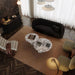 Wide Angle Top View of The Romulus Nesting Coffee Table in Viola Marble in a Living Room