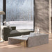 The Terra Modular Coffee Table Set in a Living Room Next To Chaise