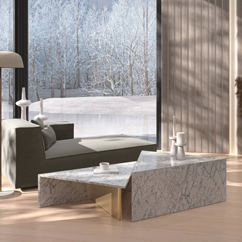 The Terra Modular Coffee Table Set in a Living Room Next To Chaise