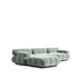 Angled Side Facing View of The Belia Sectional Sofa in Moonstone Color and Fabric