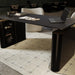 Front Facing View of a Lowered Eryk/Athena E-Standing Desk in Black With an Eryk Standing Desk Base