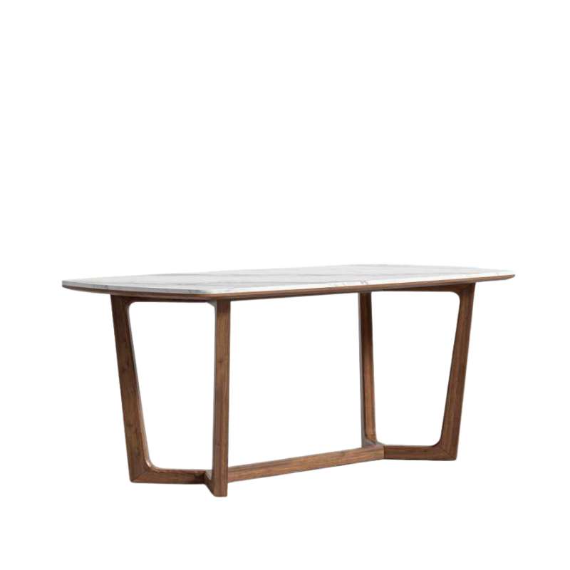 Angled Side View of The Evelyn Dining Table in White Calacatta Ceramic