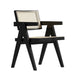 Angled Side View of The Javert Armchair in Ebony and Pale Cane