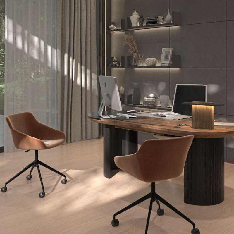 The Julian Office Chair in Black Fabric at a Desk