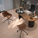 Top View of The Julian Office Chair in Black Fabric Next to a Desk