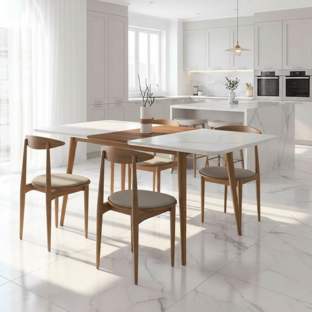 Wide View of The Marcus Dining Table in a White Lacquer With a Walnut Veneer Leaf Extension in a Dining Room