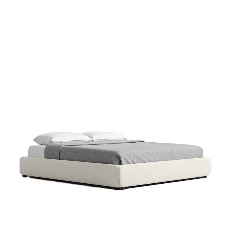 Angled Side View of The Modular Bed Frame in pearl Fabric