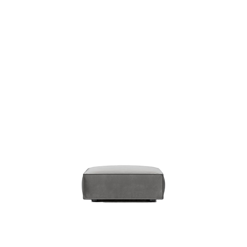 Front Facing View of The Porter Ottoman in Glacier Grey Color and Fabric