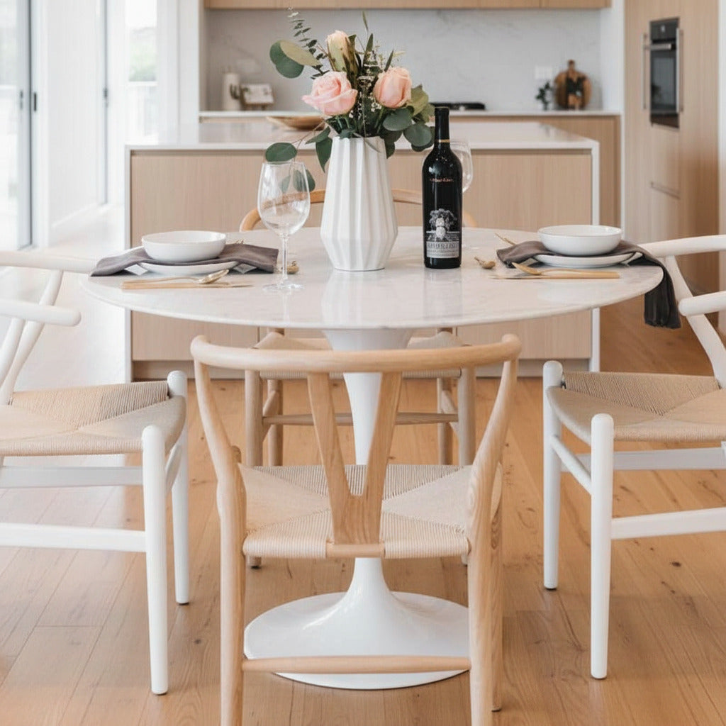 The Tulip Table Round With White Carrara Marble Surface and White Base With Table Setting