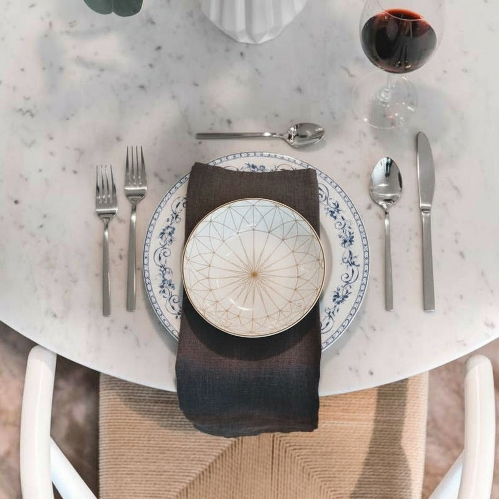 Top View of of Table Setting on The Tulip Table Round With White Carrara Marble Surface and White Base