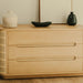 Front Facing View of The Wishbone Dresser in a Bedroom